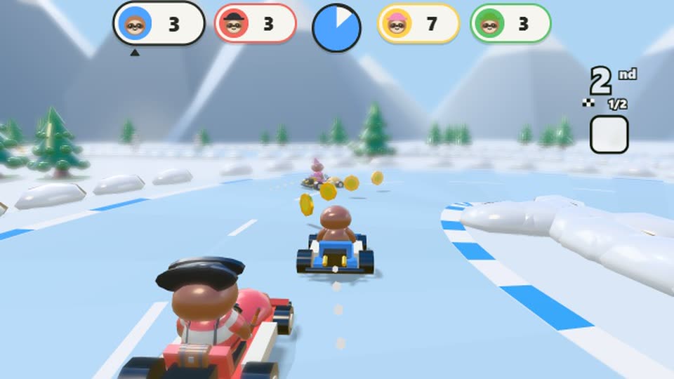 Karts sliding round the icy hairpin on the Frosty Peak track