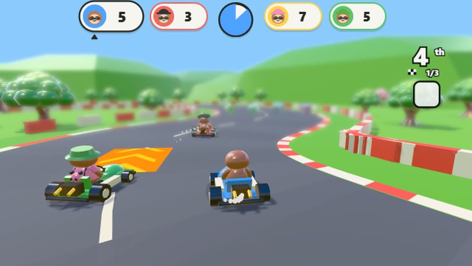 Sloth karts racing round the Plaza Loop through the town